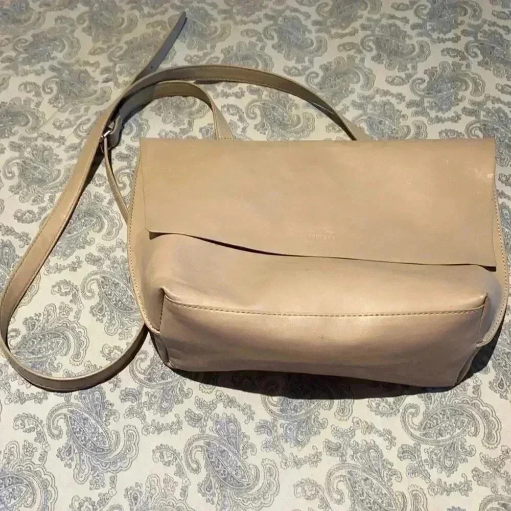 Roots crossbody